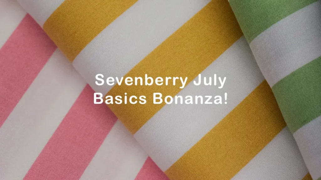 sevenberry striped fabric, 3 cotton fabrics laid on each other with different coloured striped, a bolt of pink striped fabric, yellow stripes, and green stripes